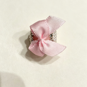 Pink bow bead